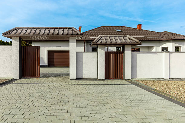 istock Modern House with Gated Entrance and Garage 2207286548