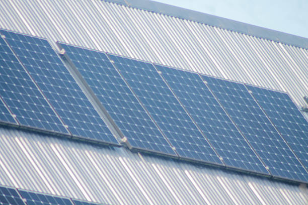 istock Solar panels on household roof 2207292659