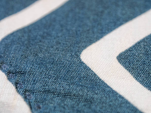 istock A fabric texture macro shot that highlights details and patterns, perfect for design projects and illustrations. 2207297159