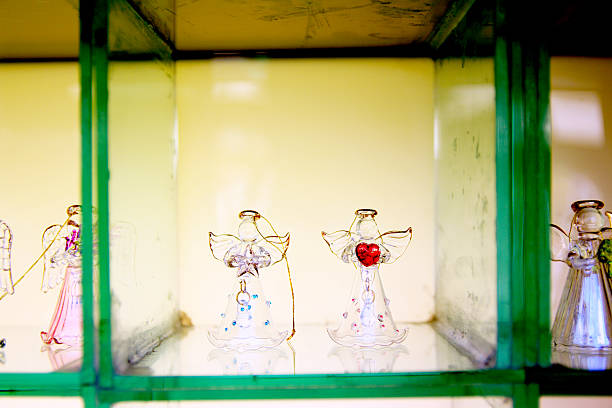 Glass Angel Figurines in Green Display Case