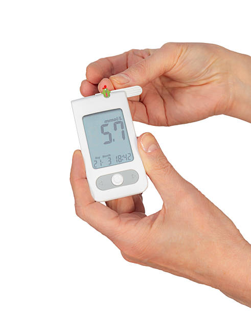 istock Person Measuring Blood Sugar Using Glucometer for Diabetes Management 2207303204