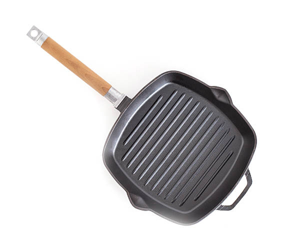 istock Grill pan with wooden handle on white background, isolate, close-up, barbecue 2207303218