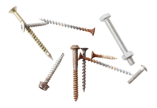 A collection of different types of screws and nails. The screws and nails are all different sizes and shapes