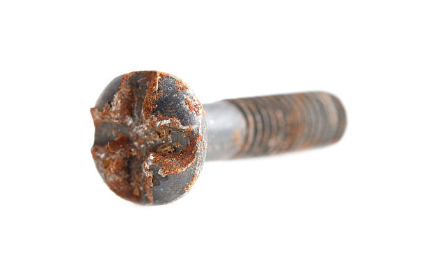 istock A rusted screw with a cross on it 2207305919