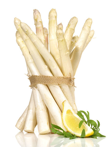 istock White Asparagus with Lemon and Tarragon - Isolated 2207306171
