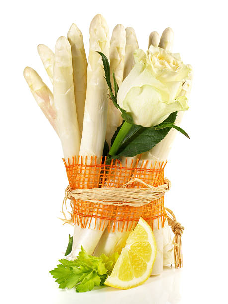 istock White Asparagus with a Rose Flower - Isolated 2207306201