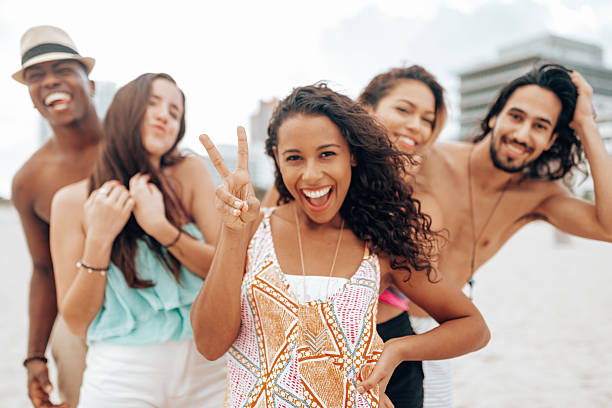 istock happiness friends all together at the beach 2207307061