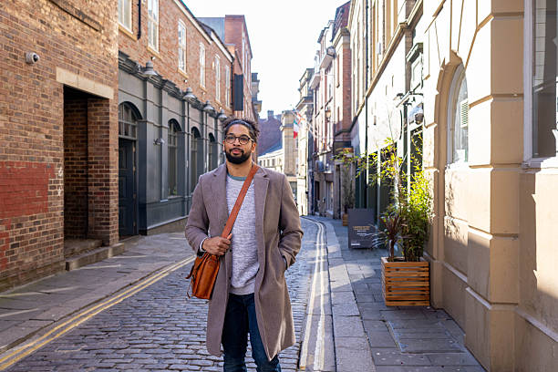 istock Confident Businessman Walking Through The City 2207314723