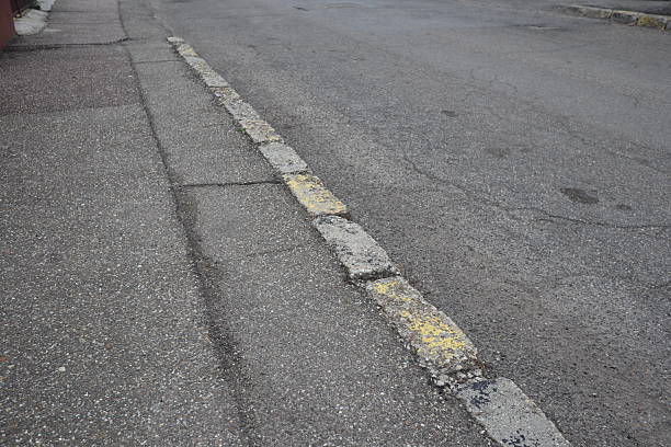 istock Degraded public road accession way 2207316492