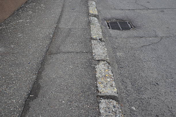 istock Degraded public road accession way 2207316548