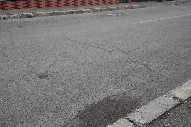 istock Degraded public road accession way 2207316551