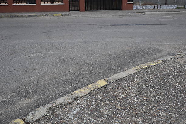 istock Degraded public road accession way 2207317278