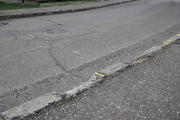istock Degraded public road accession way 2207317332