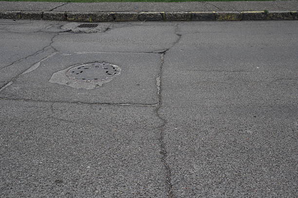 istock Degraded public road accession way 2207317334