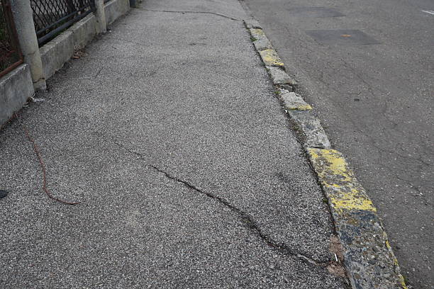 istock Degraded public road accession way 2207317539