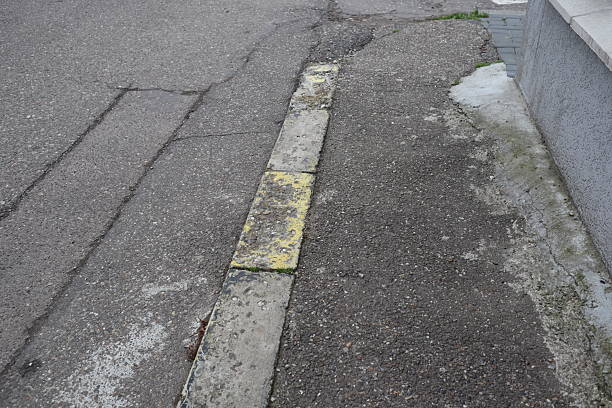 istock Degraded public road accession way 2207317850