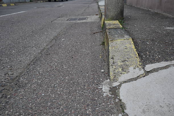 istock Degraded public road accession way 2207317915