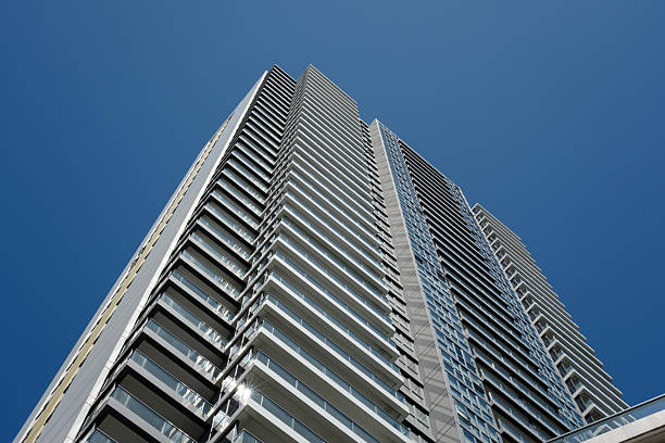 Cloudless blue sky and city buildings