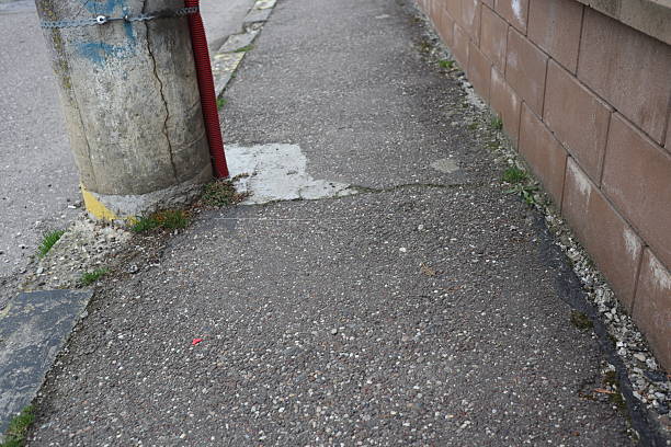 istock Degraded public road accession way 2207318026
