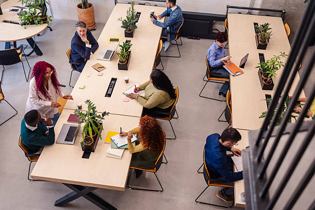 istock Coworkers collaborating and working in modern office space 2207318043