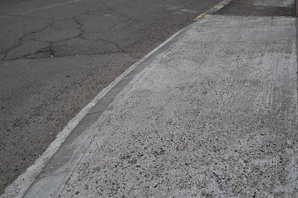 istock Degraded public road accession way 2207318113