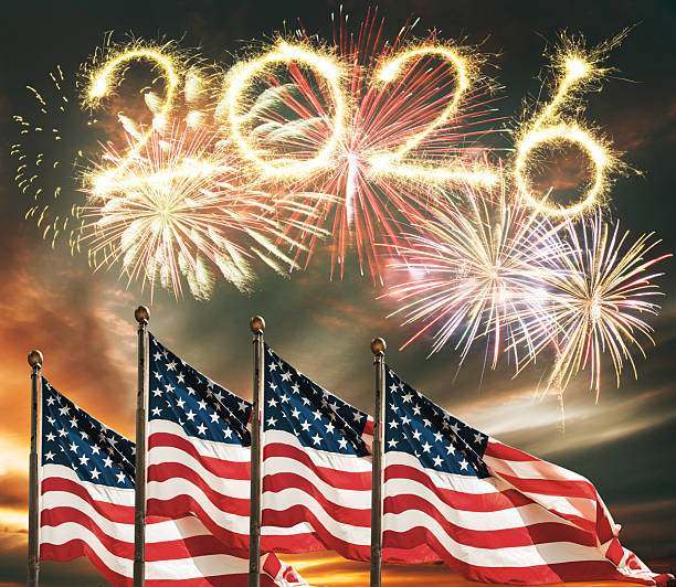 istock 2026 fireworks in Usa with Us flag 2207319164