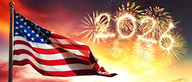 istock 2026 fireworks in Usa with Us flag 2207319174