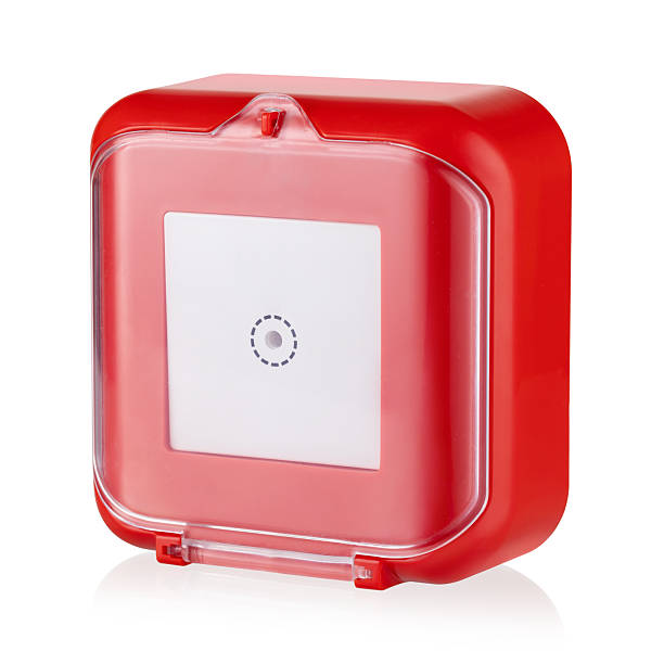 istock Red plastic housing of emergency button isolated on white background, used to start fire extinguisher, smoke removal or emergency exit 2207319183