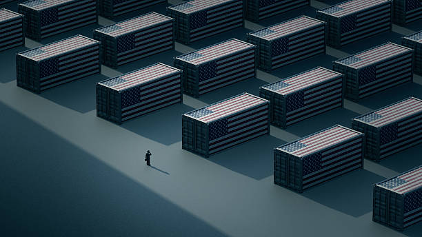 istock Shipping Containers Covered in American flags – Symbolizing Trade Tariffs and Global Trade Challenges 2207322505