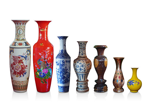 front view seven colorful sizes of ceramic vases arranged in one row, on white background, object, antique, decor, fashion, copy space