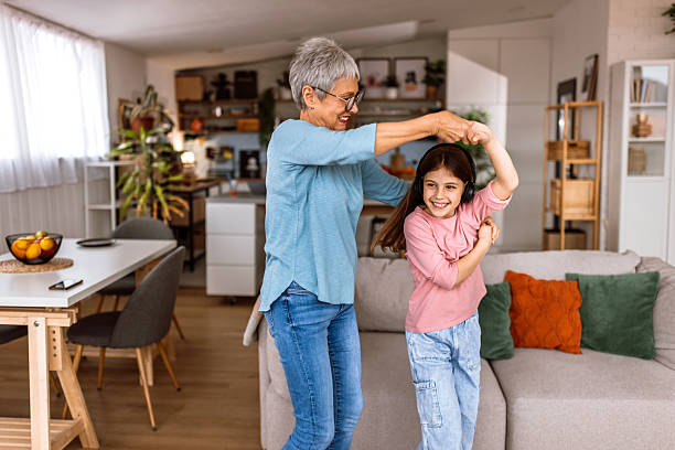istock Grandma and graddaughter making a house party 2207324951