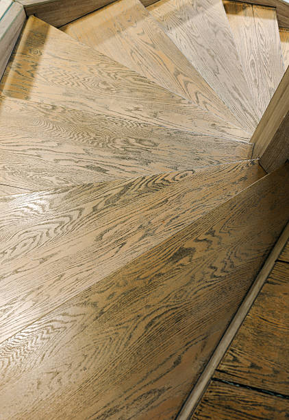 istock Rotating downward wooden staircase 2207326979