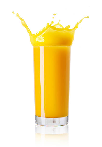 istock Glass of orange juice on white background 2207332208