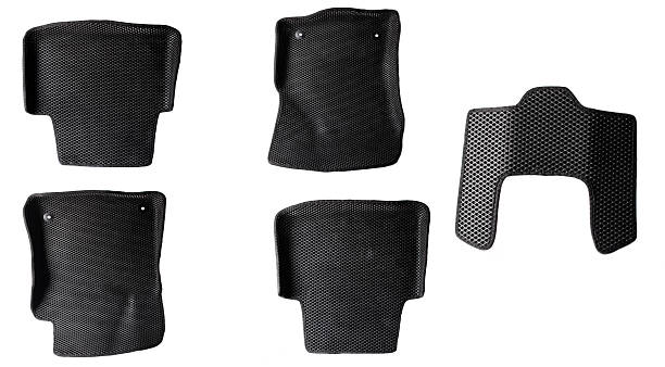 istock Set of car mats for a car interior on a white background, isolate 2207342716