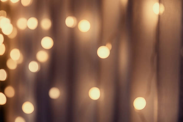 istock Garlands with warm, cozy lights creates a beautiful bokeh effect 2207343285