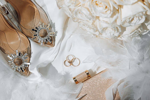 istock A pair of high heels with a diamond-shaped shoe embellishment sit on a white tab 2207344231