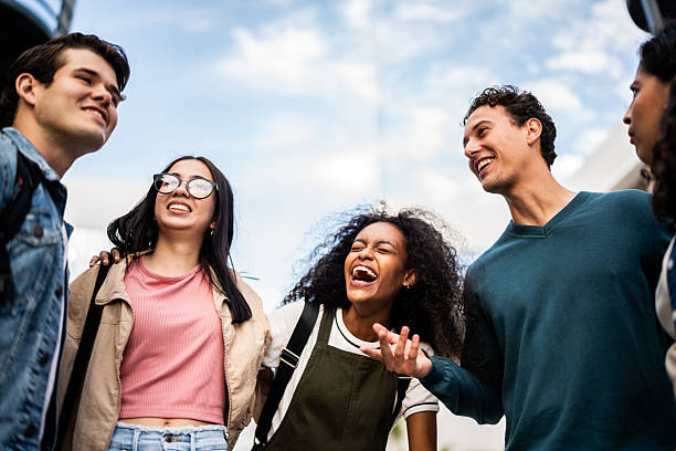 istock Young student friends talking outdoors 2207347693