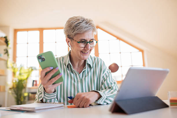 istock Woman working with a tablet at home 2207352891