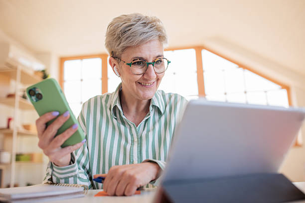 istock Woman working with a tablet at home 2207352895