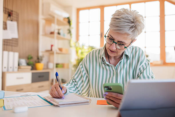 istock Woman working with a tablet at home 2207352903