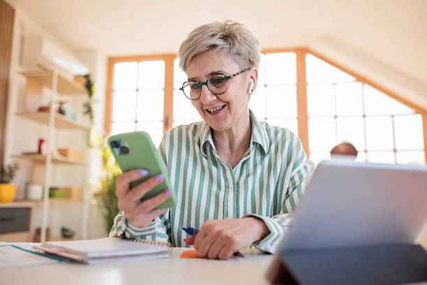 istock Woman working with a tablet at home 2207352919