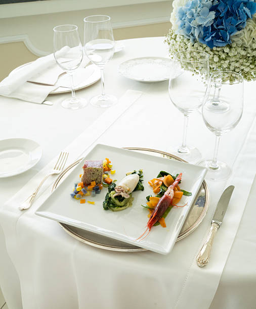istock Plate of grilled fish and squid on a table in an elegant restaurant 2207354217
