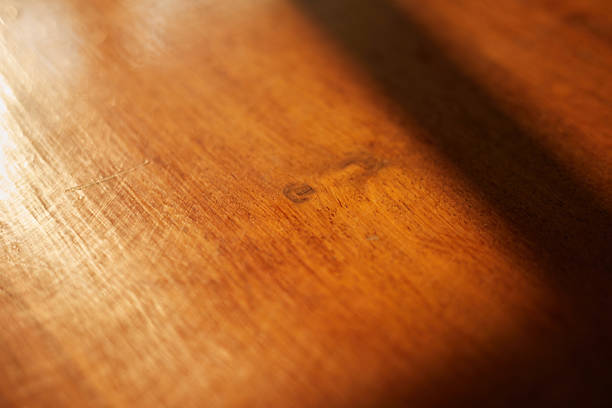 istock Light and Shadow from window on wood ground 2207354409