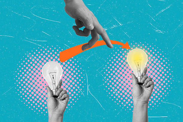 istock Idea generation showing hand guiding change from unlit to lit light bulb on dotted turquoise background 2207354530