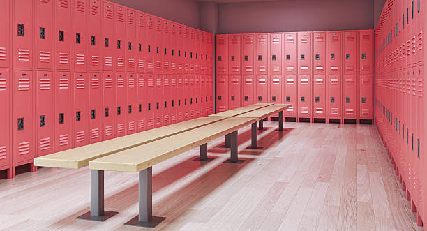 istock Empty pink locker room with benches in a school or gym 2207355105
