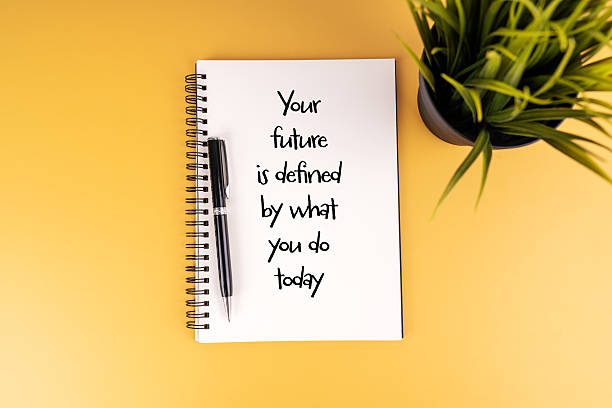 istock You future is defined by what you do today written on a notepad.Inspirational wording 2207358949