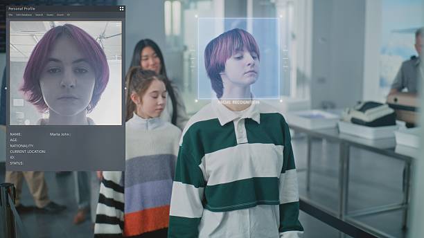 istock Queue of Diverse People Passing Biometric AI Face Identification at Border Control in Airport Terminal 2207359313
