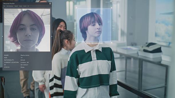 istock Queue of Diverse People Passing Biometric AI Face Identification at Border Control in Airport Terminal 2207360275