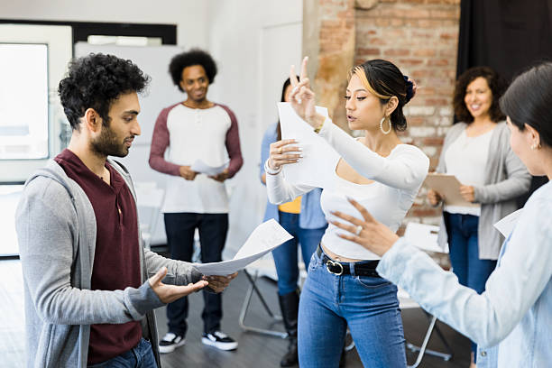 istock Multiracial Group of Adults Working Together in a Casual Setting 2207360883