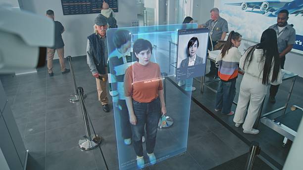 istock Airport Checkpoint: Queue of Diverse People Passing Biometric AI Face Scanning at Border Control 2207361280